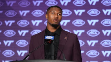 Jul 23, 2024; Charlotte, NC, USA; Virginia Tech quarterback Kyron Drones answers questions from the media during the ACC Kickoff at Hilton Charlotte Uptown. Mandatory Credit: Jim Dedmon-USA TODAY Sports