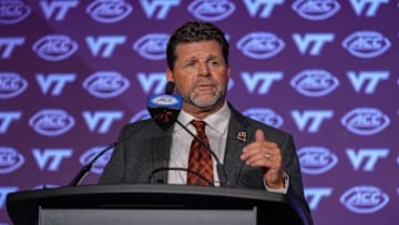 Jul 23, 2024; Charlotte, NC, USA; Virginia Tech head coach Brent Pry answers questions from the media during the ACC Kickoff at Hilton Charlotte Uptown. Mandatory Credit: Jim Dedmon-Imagn Images
