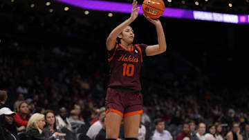 Nov 10, 2024; Charlotte, NC, USA; Virginia Tech Hokies forward Carys Baker (10) shoots a jumper against the Iowa Hawkeyes during the second half at Spectrum Center. Mandatory Credit: Jim Dedmon-Imagn Images