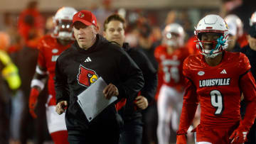Louisville        s Jeff Brohm comes out onto the field against Notre Dame at L & N Stadium.
Oct. 7, 2023