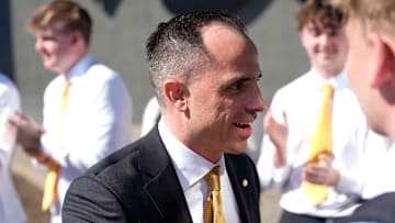 Iowa's new head men's basketball coach Ben McCollum walks into his introductory press conference Tuesday, March 25, 2025 at Carver-Hawkeye Arena in Iowa City, Iowa.