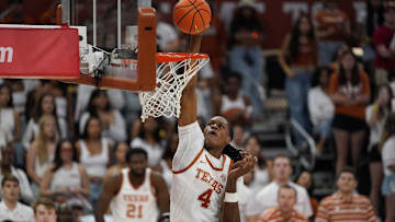 Nov 16, 2024; Austin, Texas, USA; Texas Longhorns forward Jamie Vinson (4) dunks during the second half against the Mississippi Valley State Delta Devils at Moody Center.