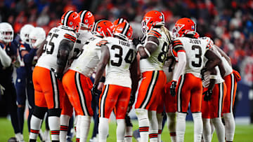 Dec 2, 2024; Denver, Colorado, USA; Members of the Cleveland Browns offensive team huddle in the second half against the Denver Broncos at Empower Field at Mile High. Mandatory Credit: Ron Chenoy-Imagn Images