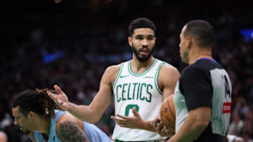 Dec 7, 2024; Boston, Massachusetts, USA; Boston Celtics forward Jayson Tatum (0) talks to the referee during the second half against the Memphis Grizzlies at TD Garden. Mandatory Credit: Paul Rutherford-Imagn Images