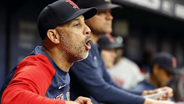  Boston Red Sox manager Alex Cora (13) reacts against the Tampa Bay Rays during the seventh inning at Tropicana Field.