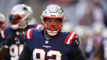 Dec 15, 2024; Glendale, Arizona, USA; New England Patriots defensive tackle Davon Godchaux (92) against the Arizona Cardinals at State Farm Stadium. Mandatory Credit: Mark J. Rebilas-Imagn Images