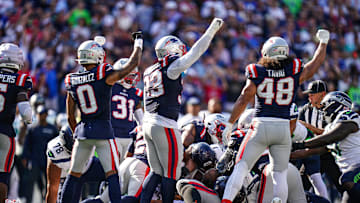 Sep 15, 2024; Foxborough, Massachusetts, USA; New England Patriots cornerback Christian Gonzalez (0), linebacker Jahlani Tavai (48) and teammates react after stoping the Seattle Seahawks short of the first down in the second half at Gillette Stadium. Mandatory Credit: David Butler II-Imagn Images