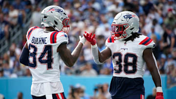 New England Patriots running back Rhamondre Stevenson (38) celebrates his touchdown with wide receiver Kendrick Bourne (84) in the third quarter at Nissan Stadium in Nashville, Tenn., Sunday, Nov. 3, 2024.