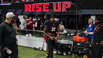 Jan 5, 2025; Atlanta, Georgia, USA; Atlanta Falcons quarterback Michael Penix Jr. (9) leaves the field after the Falcons lost to the Carolina Panthers in overtime at Mercedes-Benz Stadium. Mandatory Credit: Dale Zanine-Imagn Images