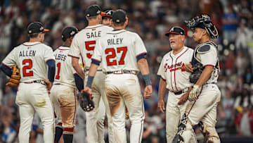 Jun 18, 2025; Cumberland, Georgia, USA; Atlanta Braves manager Brian Snitker (43) walks to the mound to replace starting pitcher Chris Sale (51) against the New York Mets during the ninth inning at Truist Park. Mandatory Credit: Dale Zanine-Imagn Images