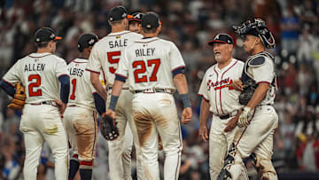 Jun 18, 2025; Cumberland, Georgia, USA; Atlanta Braves manager Brian Snitker (43) walks to the mound to replace starting pitcher Chris Sale (51) against the New York Mets during the ninth inning at Truist Park. Mandatory Credit: Dale Zanine-Imagn Images