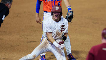 Florida St. infielder Alex Lodise (1) reacts to his triple at third base against Florida utility Bobby Boser (6) during the seventh inning of an NCAA college baseball matchup Tuesday, March 25, 2025 at VyStar Ballpark in Jacksonville, Fla. FSU rallied to defeat UF 8-4 off a walk-off grand slam from Alex Lodise in the ninth inning. [Corey Perrine/Florida Times-Union]