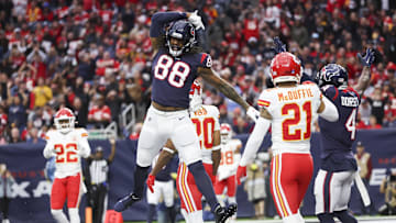 Dec 18, 2022; Houston, Texas, USA; Houston Texans tight end Jordan Akins (88) celebrates after scoring a touchdown   during the third quarter against the Kansas City Chiefs during the third quarter at NRG Stadium. Mandatory Credit: Kevin Jairaj-Imagn Images