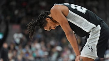Mar 10, 2025; San Antonio, Texas, USA;  San Antonio Spurs guard Devin Vassell (24) catches his breath in the second half against the Dallas Mavericks at Frost Bank Center. Mandatory Credit: Daniel Dunn-Imagn Images