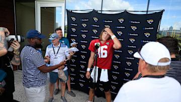 Jacksonville Jaguars quarterback Trevor Lawrence (16) answers questions from the media after an NFL training camp session at the Miller Electric Center, Thursday, Aug. 14, 2025 in Jacksonville, Fla.