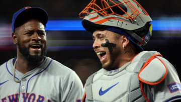 Jun 18, 2024; Arlington, Texas, USA; New York Mets pitcher Luis Severino (40) (L) and catcher Francisco Alvarez (4) walk off the field in the fifth inning against the Texas Rangers at Globe Life Field. Mandatory Credit: Tim Heitman-USA TODAY Sports
