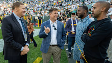 Green Bay Packers president Mark Murphy, left, and general manger Brian Gutekunst, middle, are shown before their game against the Houston Texans Sunday, October 20, 2024 at Lambeau Field in Green Bay, Wisconsin.
