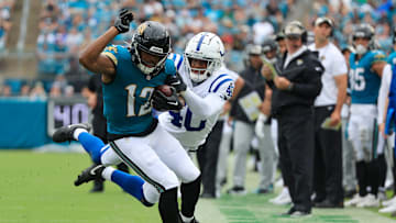 Jacksonville Jaguars wide receiver Devin Duvernay (12) tiptoes as he is tackled out of bounds by Indianapolis Colts cornerback Jaylon Jones (40) during the second quarter of an NFL football matchup Sunday, Oct. 6, 2024 at EverBank Stadium in Jacksonville, Fla. The Jaguars edged the Colts on a field goal 37-34. 