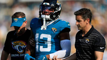 Jacksonville Jaguars wide receiver Christian Kirk (13) leaves the field to the locker room after sustaining an apparent injury during the fourth quarter of an NFL football matchup Sunday, Oct. 27, 2024 at EverBank Stadium in Jacksonville, Fla. The Packers edged the Jaguars 30-27 on a last-second field goal. [Corey Perrine/Florida Times-Union]