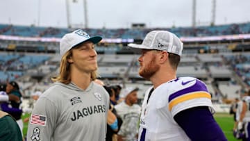 Jacksonville Jaguars quarterback Trevor Lawrence (16), left, and Minnesota Vikings quarterback Sam Darnold (14) talk after the game of an NFL football matchup Sunday, Nov. 10, 2024 at Everbank Stadium in Jacksonville, Fla. The Vikings defeated the Jaguars 12-7. [Corey Perrine/Florida Times-Union]