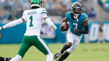 Jacksonville Jaguars wide receiver Brian Thomas Jr. (7) rushes for yards against New York Jets cornerback Sauce Gardner (1) during the first quarter Sunday, Dec. 15, 2024 at EverBank Stadium in Jacksonville, Fla. [Corey Perrine/Florida Times-Union]