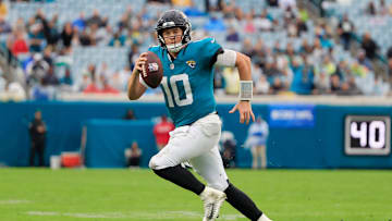 Jacksonville Jaguars quarterback Mac Jones (10) rushes for yards during the fourth quarter Sunday, Dec. 29, 2024 at EverBank Stadium in Jacksonville, Fla. The Jaguars held off the Titans 20-13. [Corey Perrine/Florida Times-Union]