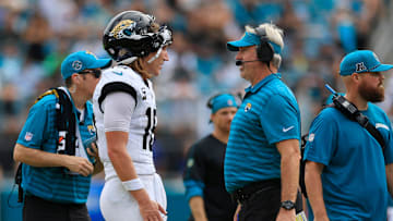 Jacksonville Jaguars quarterback Trevor Lawrence (16) talks with head coach Doug Pederson during the fourth quarter of an NFL football matchup Sunday, Sept. 15, 2024 at EverBank Stadium in Jacksonville, Fla. The Browns defeated the Jaguars 18-13. [Corey Perrine/Florida Times-Union]