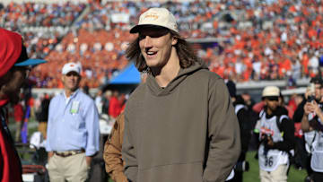 Jacksonville Jaguars quarterback Trevor Lawrence talks on the Clemson sideline during the third quarter of an NCAA football matchup in the TaxSlayer Gator Bowl Friday, Dec. 29, 2023 at EverBank Stadium in Jacksonville, Fla. The Clemson Tigers edged the Kentucky Wildcats 38-35. 