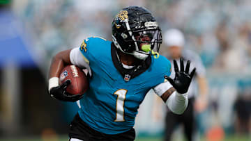 Jacksonville Jaguars running back Travis Etienne Jr. (1) rushes for yards during the second quarter Sunday, Dec. 15, 2024 at EverBank Stadium in Jacksonville, Fla. [Corey Perrine/Florida Times-Union]