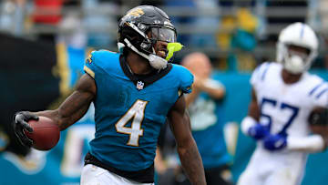Jacksonville Jaguars running back Tank Bigsby (4) reacts to his touchdown score during the fourth quarter of an NFL football matchup Sunday, Oct. 6, 2024 at EverBank Stadium in Jacksonville, Fla. The Jaguars edged the Colts on a field goal 37-34. [Corey Perrine/Florida Times-Union]