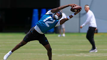 Jacksonville Jaguars wide receiver Travis Hunter (12) catches a pass during the first organized team activity at Miller Electric Center Monday, May 19, 2025 in Jacksonville, Fla.