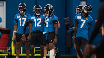 Jacksonville Jaguars wide receiver Travis Hunter (12) dances during as wide receiver Brian Thomas Jr. (7) reacts the 10th organized team activity at Miller Electric Center Wednesday, June 4, 2025 in Jacksonville, Fla. [Corey Perrine/Florida Times-Union]