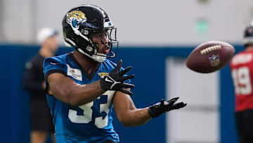 Jacksonville Jaguars running back Bhayshul Tuten (33) catches a pass during the 10th organized team activity at Miller Electric Center Wednesday, June 4, 2025 in Jacksonville, Fla. [Corey Perrine/Florida Times-Union]