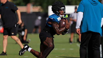 Jacksonville Jaguars running back Tank Bigsby (4) runs the ball during an NFL training camp session at the Miller Electric Center, Friday, July 25, 2025, in Jacksonville, Fla. [Corey Perrine/Florida Times-Union]