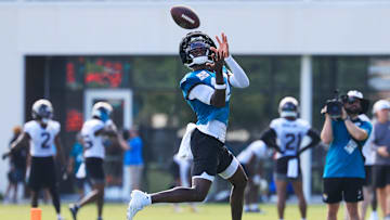 Jacksonville Jaguars wide receiver Travis Hunter (12) catches a pass during an NFL training camp session at the Miller Electric Center, Sunday, Aug. 3, 2025, in Jacksonville, Fla. [Corey Perrine/Florida Times-Union]