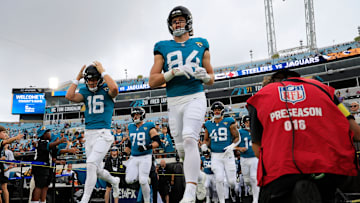 Jacksonville Jaguars quarterback Trevor Lawrence (16) and tight end Hunter Long (84) runs on the field before an NFL preseason matchup at EverBank Stadium, Saturday, Aug. 9, 2025 in Jacksonville, Fla.