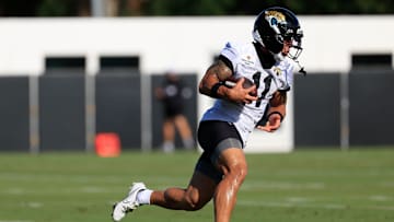 Jacksonville Jaguars wide receiver Parker Washington (11) runs the ball during an NFL training camp session at the Miller Electric Center, Monday, Aug. 11, 2025 in Jacksonville, Fla. 