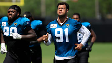 Jacksonville Jaguars defensive end Arik Armstead (91) runs after an NFL training camp session at the Miller Electric Center, Thursday, Aug. 14, 2025 in Jacksonville, Fla.