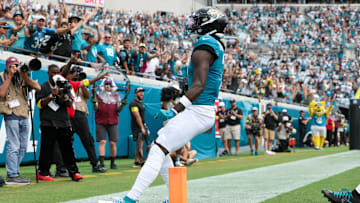 Sep 7, 2025; Jacksonville, Florida, USA; Jacksonville Jaguars wide receiver Brian Thomas Jr. (7) reacts after scoring on a 9-yard touchdown run against the Carolina Panthers during the first half at EverBank Stadium. 
