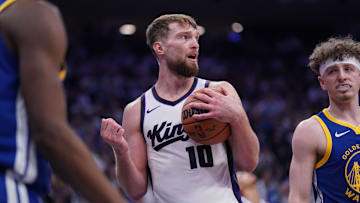 Apr 16, 2024; Sacramento, California, USA; Sacramento Kings forward Domantas Sabonis (10) reacts after being called for a foul against the Golden State Warriors in the second quarter during a play-in game of the 2024 NBA playoffs at the Golden 1 Center. Mandatory Credit: Cary Edmondson-Imagn Images