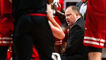 Feb 1, 2024; Lincoln, Nebraska, USA; Wisconsin Badgers head coach Greg Gard talks to players during a timeout against the Nebraska Cornhuskers in the first half at Pinnacle Bank Arena. Mandatory Credit: Dylan Widger-Imagn Images