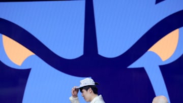 Jun 25, 2025; Brooklyn, NY, USA;  Yang Hansen after being selected as the 16th pick by the Memphis Grizzlies in the first round of the 2025 NBA Draft at Barclays Center. Mandatory Credit: Brad Penner-Imagn Images