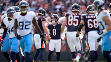 Bears kicker Cairo Santos celebrates with teammates after one of his three field goals on opening day.