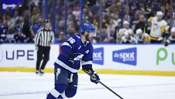 Dec 4, 2025; Tampa, Florida, USA; Tampa Bay Lightning right wing Nikita Kucherov (86) controls the puck against the Pittsburgh Penguins in the third period at Benchmark International Arena. Mandatory Credit: Nathan Ray Seebeck-Imagn Images
