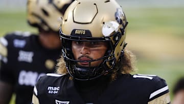 Aug 29, 2025; Boulder, Colorado, USA; Colorado Buffaloes quarterback Julian Lewis (10) warms up in the second quarter against the Georgia Tech Yellow Jackets at Folsom Field. Mandatory Credit: Ron Chenoy-Imagn Images