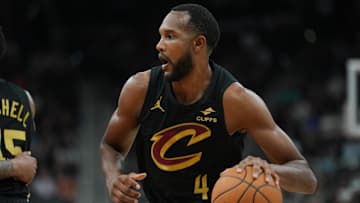 Apr 4, 2025; San Antonio, Texas, USA;  Cleveland Cavaliers forward Evan Mobley (4) dribbles in the first half against the San Antonio Spurs at Frost Bank Center. Mandatory Credit: Daniel Dunn-Imagn Images