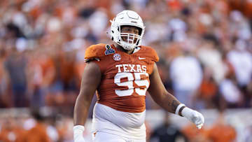 Dec 21, 2024; Austin, Texas, USA; Texas Longhorns defensive lineman Alfred Collins (95) against the Clemson Tigers during the CFP National playoff first round at Darrell K Royal-Texas Memorial Stadium.  