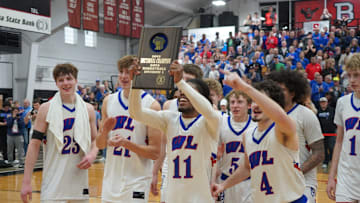 Wisconsin Lutheran Vikings players display the WIAA D1 Sectional 4 plaque to their fans after beating West Allis Central, 72-53 on Saturday, March 15, 2025 at Waukesha South High School. They now face No. 4 Oshkosh North in the first round of the WIAA 2025 State Boys Basketball Tournament.