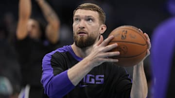 Apr 4, 2025; Charlotte, North Carolina, USA; Sacramento Kings forward Domantas Sabonis (11) shoots during warm ups before  the first quarter against the Charlotte Hornets at Spectrum Center. Mandatory Credit: Jim Dedmon-Imagn Images