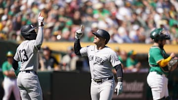 Sep 22, 2024; Oakland, California, USA; New York Yankees left fielder Jasson Dominguez (89) celebrates with third baseman Jazz Chisholm Jr. (13) after hitting a two-run home run against the Oakland Athletics in the second inning at the Oakland-Alameda County Coliseum.